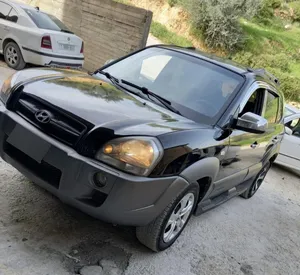 توسان-2008-ماطور-2000-20-صباب-لون-اسود