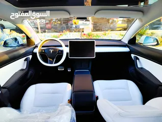  14 تيسلا 2021 model 3 فحص كامل 4 جـيـد فرش ابيض جنط 19بحالة الوكالة لون مميز للبيع بسعر لقطة ومحروووق