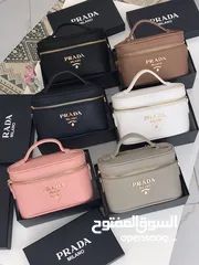  2 prada, louis vuitton, and more bags for sale 1 bag  