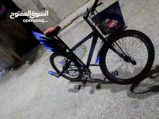  24 بيع بسكليت بحاله جيده جدااا اللون اسود وازرق واضح بالصوره غيارات شغاله وبرك شغال 100%