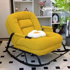  1 كنبة هزاز طبية مع مخدة لون اسود و اصفر