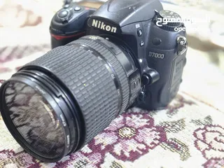  1 كاميرا تصوير نيكون D7000 اقرو التفاصيل داخل الوصف تحياتي الكم