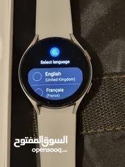  22 .   Samsung Galaxy watch 5 black  and Samsung  Galaxy  watch  4 silver