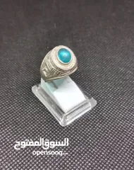  1 خاتم نقرة نايفي انيق متوج بحجر التوباز الازرق للبيع
