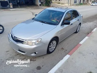  21 سوبارو امبريزا B3_موديل 2009-اتومتيك -ماتور1500بنزين -اصل برايفت-فحص نخب وشركة صلاة النبي