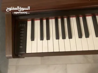  6 Greaten piano new model amazing brownish black color no key broken functioned with metronome