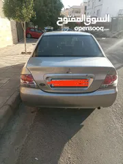  2 ميتسوبيشي لانسر موديل 2005 العقبة  4500وضعها ممتاز الحمدلله. قير توماتيك