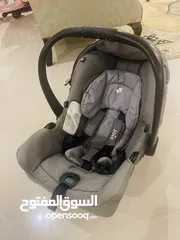  1 Joie car seat 1st stage , from new born to 13 kg , gray color , used in a very good condition