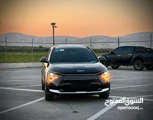  1 كايا نيرو  هايبرد (بنزين+كهرباء ) فل الفل فتحة سقف  /2022 عداد قليل 18000Km