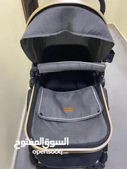  4 عرباية أطفال ماركة  belecoo قماش كتان طبي مريح يد معدن نظام بريكات للامان