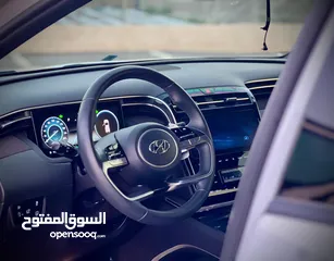  12 هونداي توسان /2022 فل الفل بدون فتحة سقف  2x4 ///240Hp بنزين + كهرباء  ( Haybrid) 1600cc