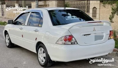  3 ميتسوبيشي لانسر 2013 ماتور 1600 سيارة خالية من اي عيوب بسعر حرق 5000 دينار السعر نهائي