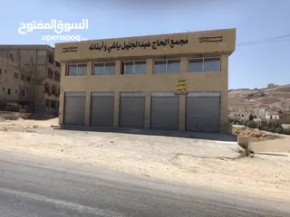  12 محلات تجارية عدد 3 مفتوحين على بعض - عين الباشا ش. تجاري حيوي الباب 195 شهري