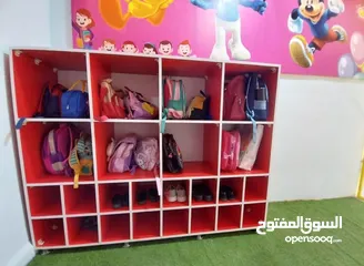  2 تجهيز خزانات عيون وخزانة حقائب وخزانة احذية وخزانة ملابس للاطفال للحضانات والروضات والمدارس