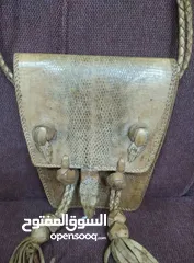  1 نوادر..حقيبة من جلد صغير تنين الكومودو