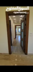  8 شقة مميزة طابق ثاني مساحة 206 م - طريق المطار - مقابل سوبر ماركت 911-سكن أ - شركة رمضان مميل للاسكان