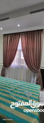  21 Quality House curtains and sofa