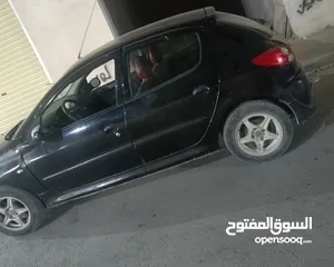  1 بيجو 206 بلص