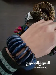  19 اساور خشبية ملونة جديدة