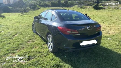  1 اوبل استرا 2014 ماتور 1400  بحاله جيده لون اسود والدفع نقدي