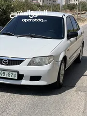  2 Mazda 323 2003