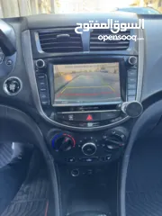  10 هونداي اكسنت 2015 محرك 1600 ديزل لون ابيض فرش جلد تشغيل بصمه حساسات خلفيه كاميرا خلفيه ترخيص وتامين