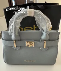  3 New Bebe women’s evie satchel bag