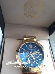  4 Versace wrist watch with gold chain strap