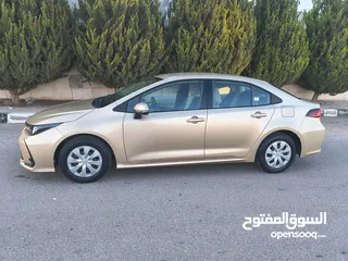  4 تويوتا كورولا 2021 لون شمباني بنزين اصلي ماتور cc1600 فحص كامل جمرك حديث