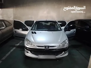  13 سياره بيجو  206  موديل  2006  للبيع  لون فضي   بحاله جيده جدا