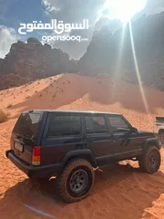  23 للبيع - جيب شيروكي XJ موديل 1999  جاهز للبر والمغامرات!