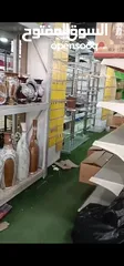  7 رفوف خشب وزجاج وسوبرماركت وقرمه ولوحة اعلانات و معرش زينكو وأبواب سيكريت مظله وألواح خشب تعليق وشبك