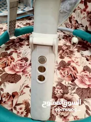  17 تخت هزاز باليد للأطفال و عربة مشي كراجة للأطفال
