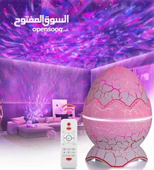  2 جهاز بيضة الديناصور مع اضائة ليزرية وصورت مدمج