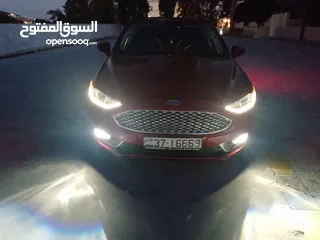  5 بسم الله ما شاء الله   فورد فيوجن 2017 لون خمري مميز للبيع ورقم مميز 7جيد فحص كامل للبيع