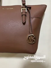  4 شنطة مايكل كورس شبه جديدة بسعر مغري جدا اصلية