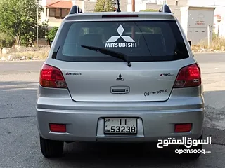  11 ميتسوبيشي آوتلاندر اوتوماتيك 2003 توب نظافة بسعرررر مميززز محرك 2400cc