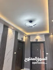  2 شقة فاخره طابق اخير مع روف بمساحة 205م للبيع في اربد مجمع عمان الجديد مقابل صالة مسايا