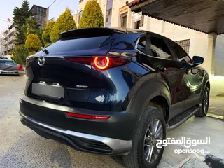  11 Mazda CX30 كهربائية بالكامل بوضع الزيرو 2021