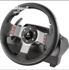 2 الموديل:Logitech G27 المحتويات:دركسون/3 دعسات/جير الحالة:نظيف جدًا يدعم PS3 والاجهزه الأحدث و PC
