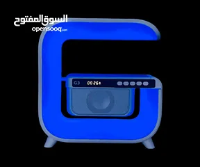  8 جاز سبيكر و شاحن لا سلكي و ساعة و مقياس حرارة 4 في 1