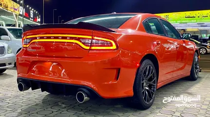  5 Dodge charger Model 2019 Color orange interior black passing guaranty