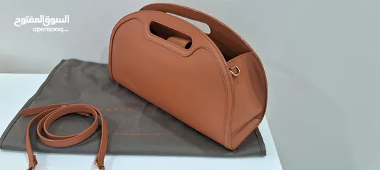  1 tags on new camel handbag unique with detachable strap