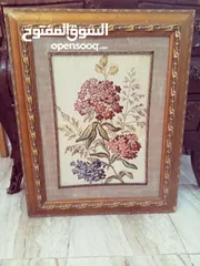  24 لوحات  رسم زيتي.. وتطريز