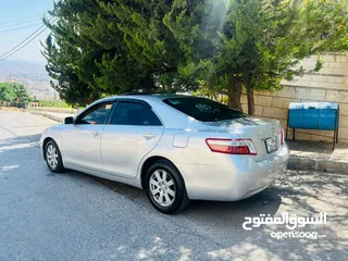 1 تويوتا كامري موديل 2009 فل كامل مع فتحه أعلى مواصفات بحالة الوكاله