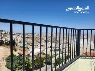  18 شقة مع رووف و ترس إطلالة أبدية خلابة  على جبال جرش و السلط في أجمل مناطق الجبيهة ابو عوف تنظيم أ