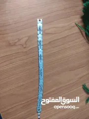  1 Stainless steel bracelet with starburst engraving. سوار ستانلس ستيل مع نقش متكرر لإنفجار نجمي