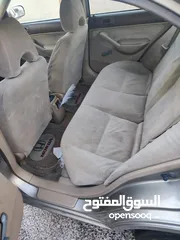  4 هوندا سيفيك لون ذهبي موديل 2003 جير عادي  إقتصادية جدا تقطع بالتنكة 280 كيلو بور ستيرنح سنتر لوك