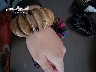  10 اساور خشبية ملونة جديدة