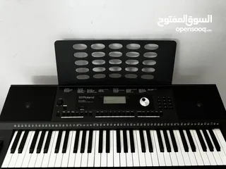  1 بيانو keyboard Roland E-x 20